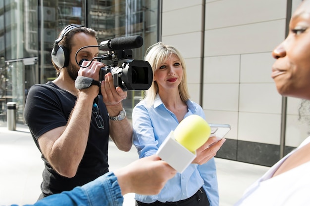 Reporter's notebook and recorder on a desk